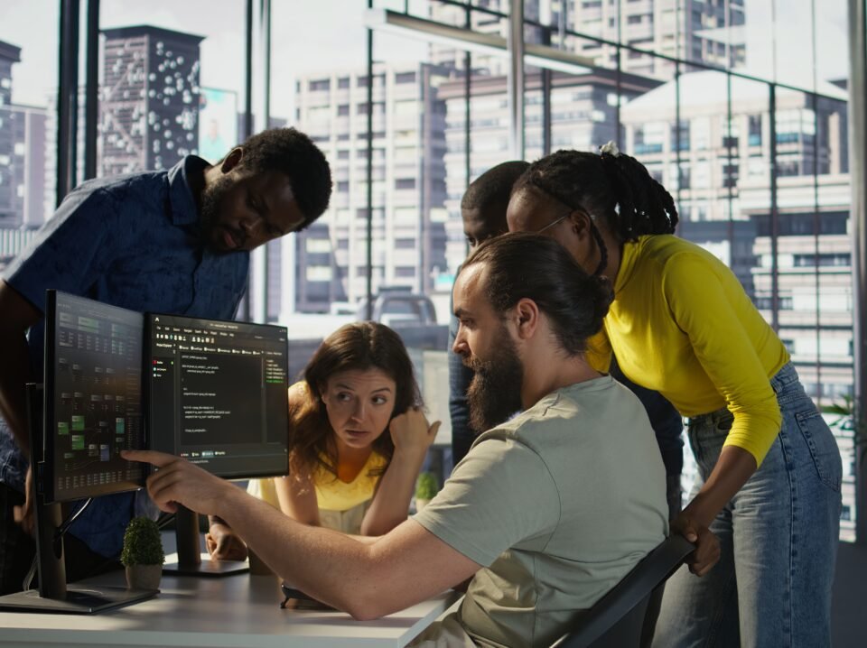 Team of software engineers doing brainstorming in office cto as a service for startups